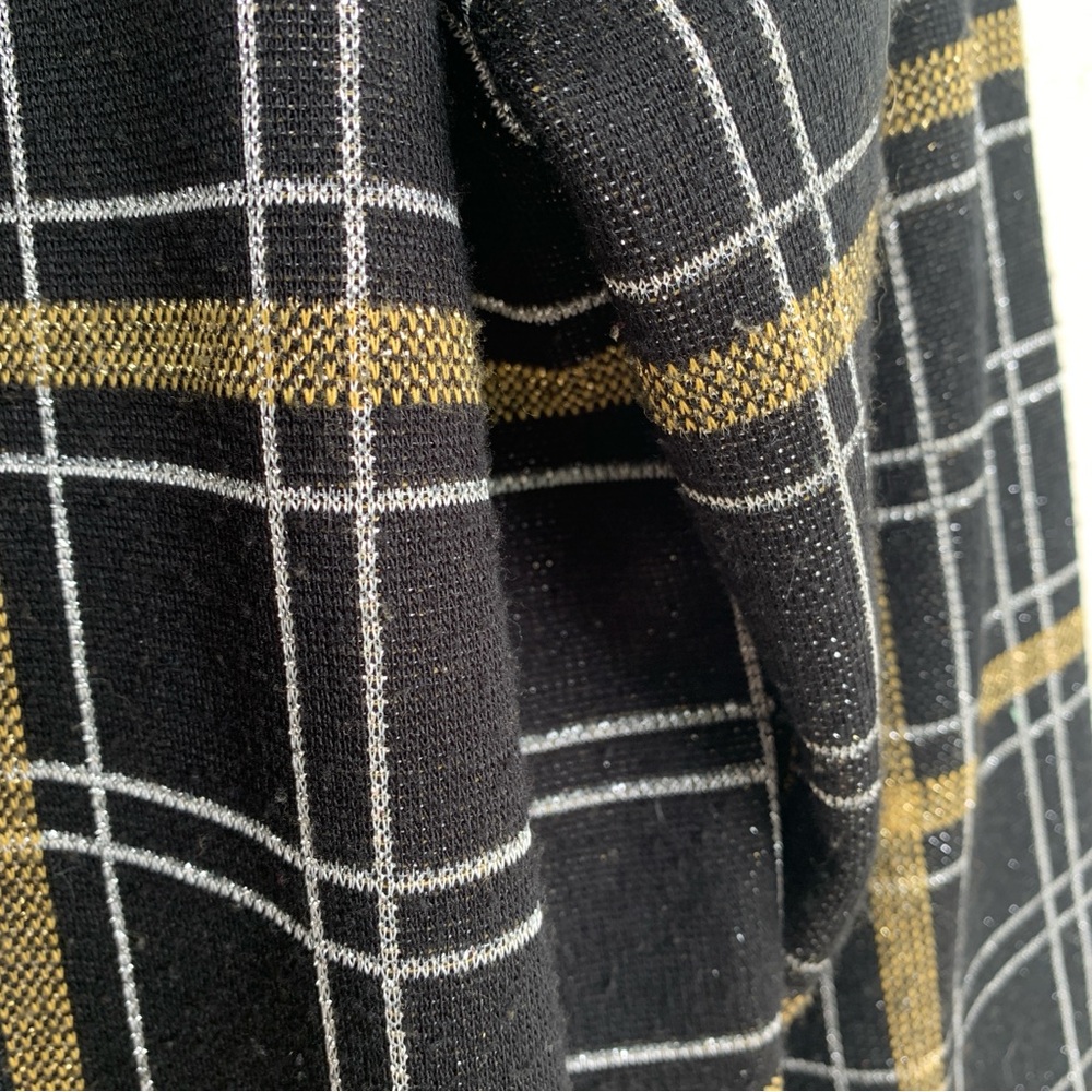 Metallic EB cardigan sweater.